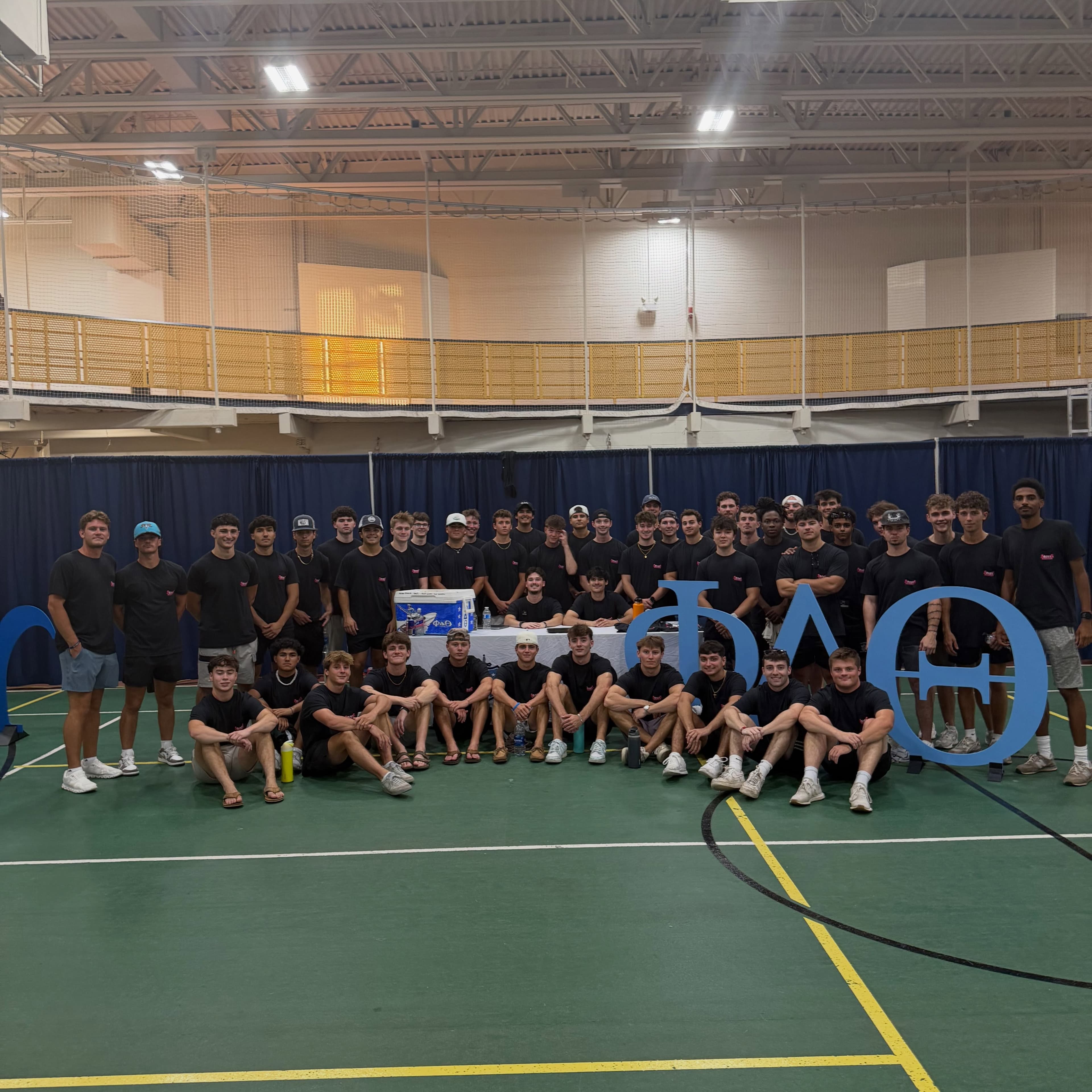 Connecticut Epsilon brothers gathered at a Greek life showcase